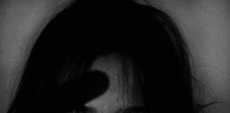 monochrome photo of woman
